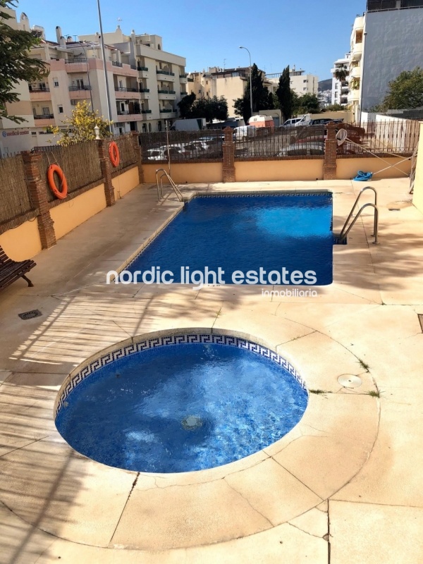 Apartment with community pool close to the Torrecilla Beach