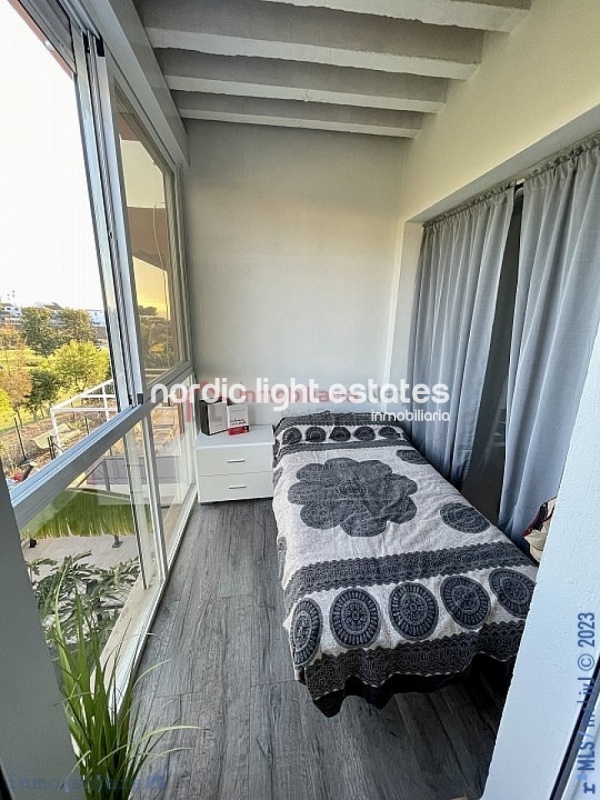 Elegante dúplex de buen gusto en Baviera Golf
