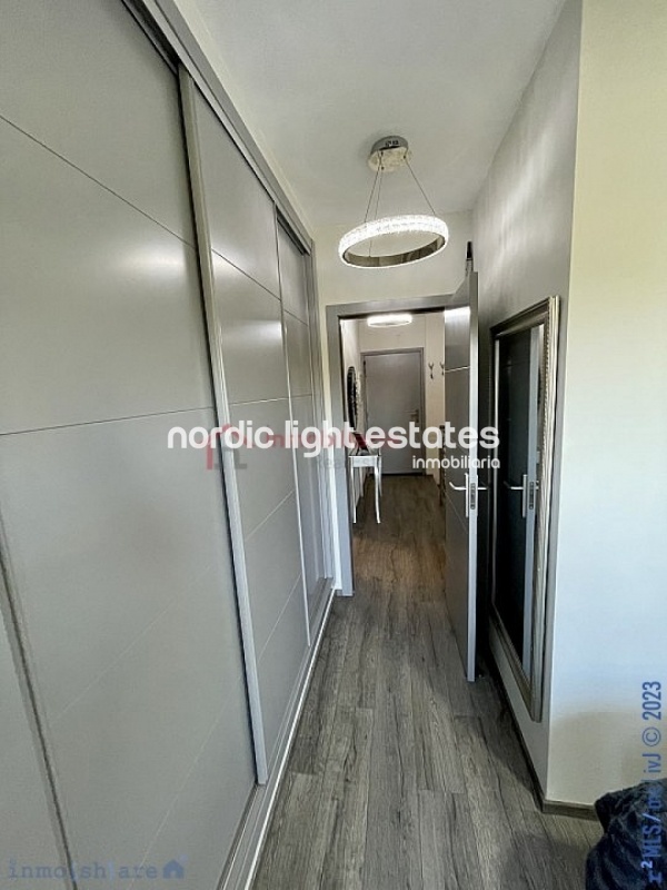 Elegante dúplex de buen gusto en Baviera Golf