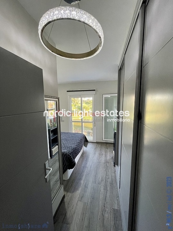 Elegante dúplex de buen gusto en Baviera Golf