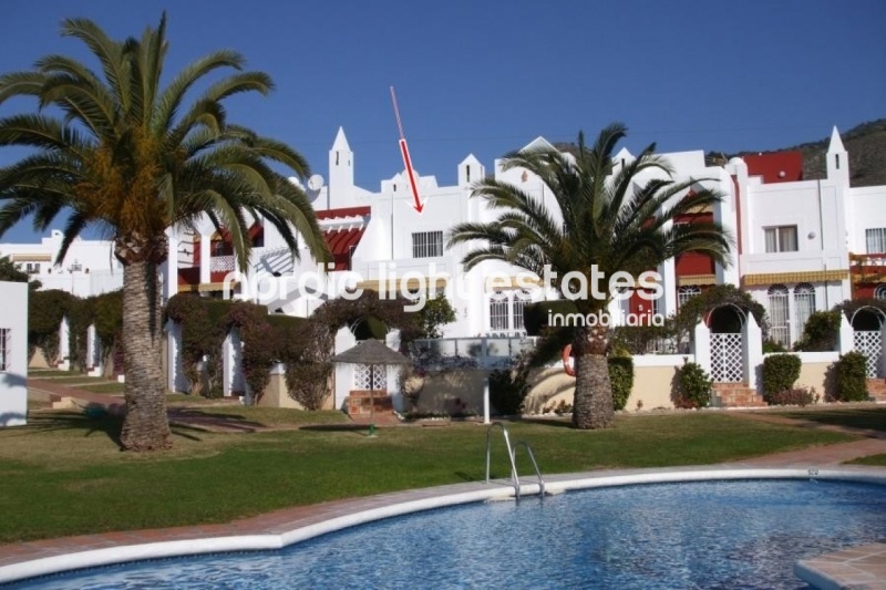 Terraced house in the urbanisation La Alambra