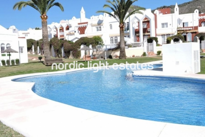 Terraced house in the urbanisation La Alambra