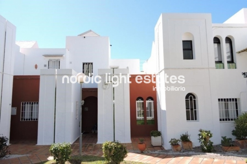Terraced house in the urbanisation La Alambra