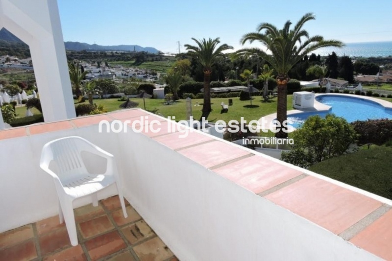 Terraced house in the urbanisation La Alambra