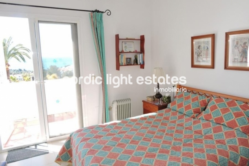 Terraced house in the urbanisation La Alambra