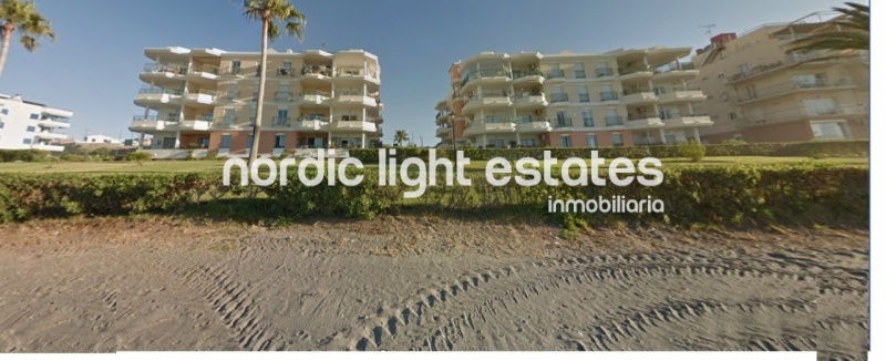 Beachfront apartment with parking space and store room