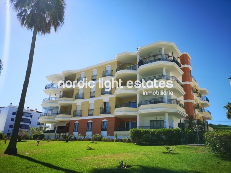 Beachfront apartment with parking space and store room