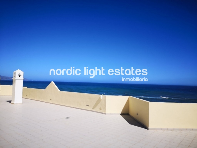 Beachfront apartment with parking space and store room