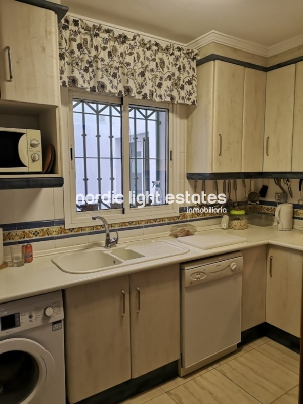 Beachfront apartment with parking space and store room