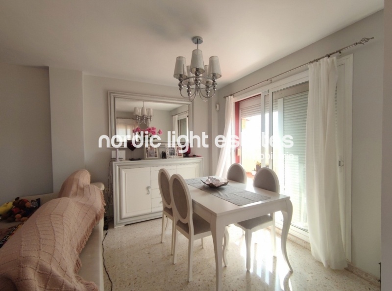 Renovated top floor apartment with 100 sqm terrace and parking space