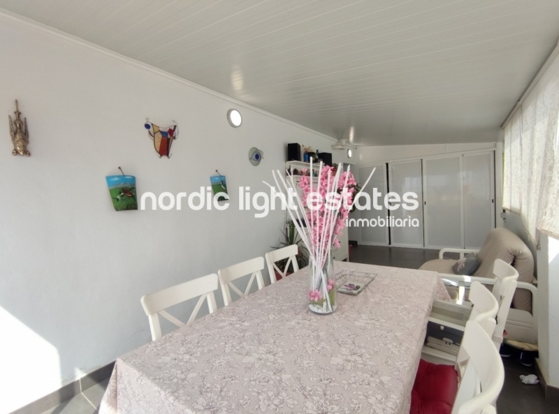 Renovated top floor apartment with 100 sqm terrace and parking space
