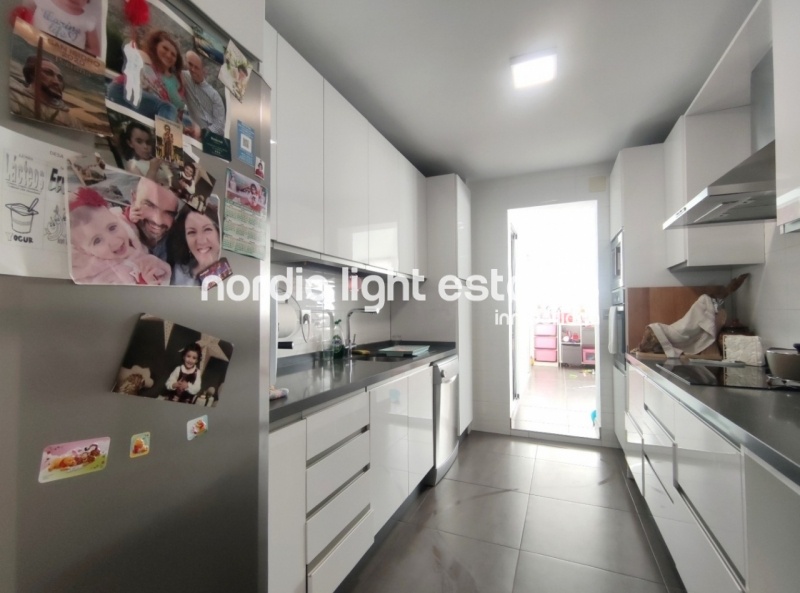 Renovated top floor apartment with 100 sqm terrace and parking space