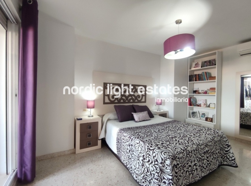 Renovated top floor apartment with 100 sqm terrace and parking space