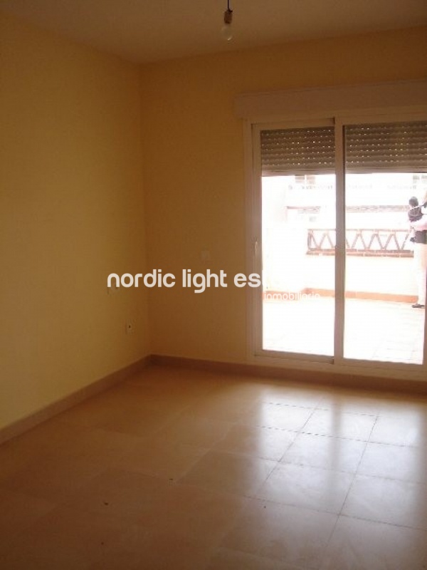 Top floor apartment located in the Baviera Golf urbanization, Caleta de Vélez