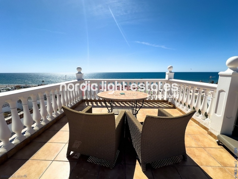 Semi detached terraced house directly opposite the sea in Torrox Costa