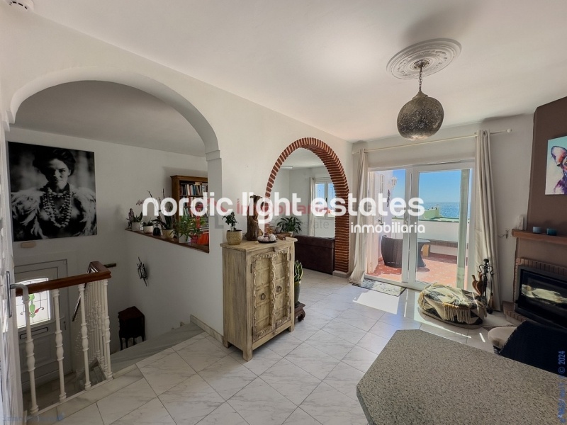 Semi detached terraced house directly opposite the sea in Torrox Costa