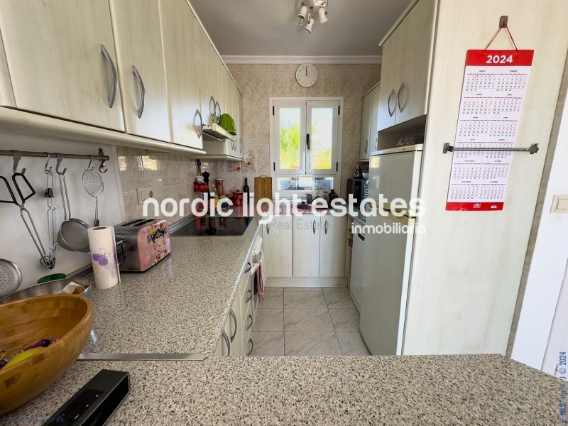 Semi detached terraced house directly opposite the sea in Torrox Costa
