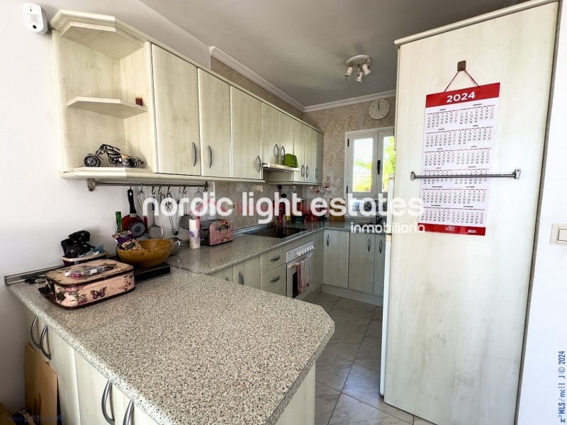 Semi detached terraced house directly opposite the sea in Torrox Costa