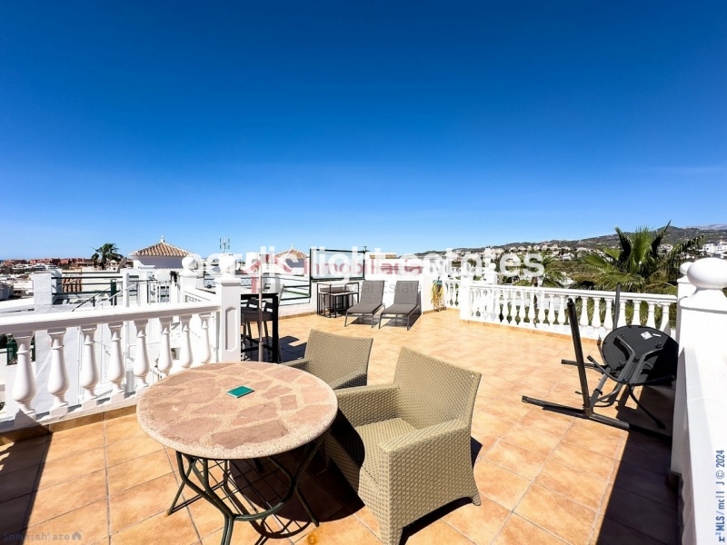 Semi detached terraced house directly opposite the sea in Torrox Costa