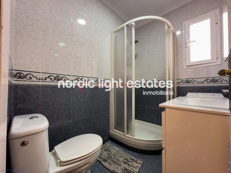 Semi detached terraced house directly opposite the sea in Torrox Costa