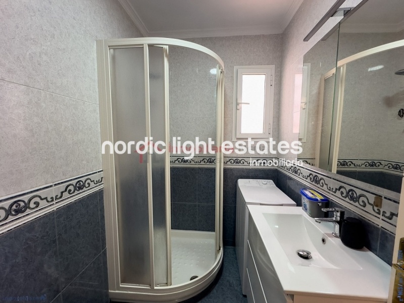 Semi detached terraced house directly opposite the sea in Torrox Costa