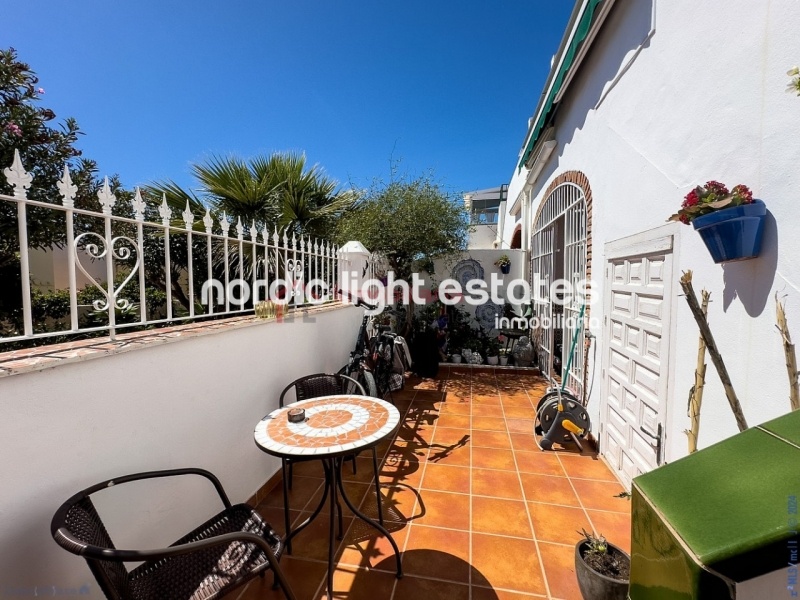 Semi detached terraced house directly opposite the sea in Torrox Costa
