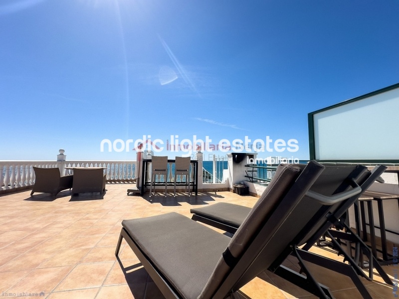 Semi detached terraced house directly opposite the sea in Torrox Costa