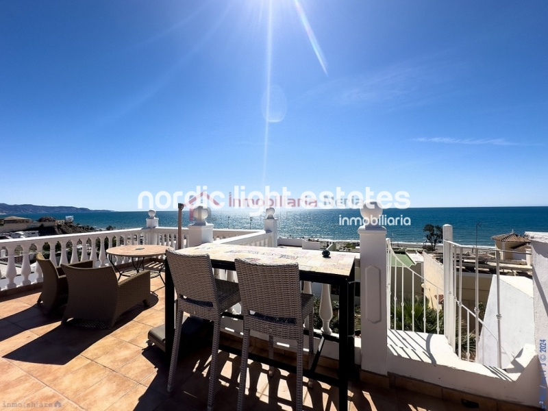 Semi detached terraced house directly opposite the sea in Torrox Costa