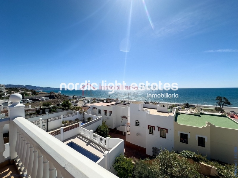 Semi detached terraced house directly opposite the sea in Torrox Costa