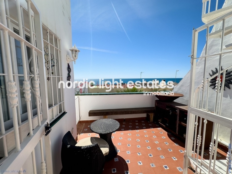 Semi detached terraced house directly opposite the sea in Torrox Costa