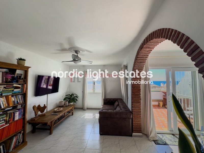 Semi detached terraced house directly opposite the sea in Torrox Costa