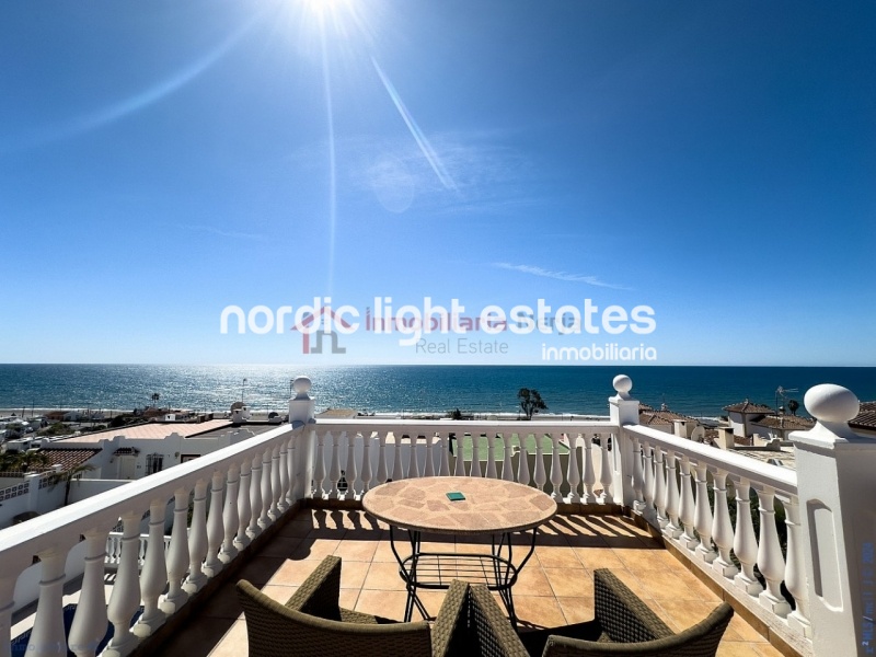 Semi detached terraced house directly opposite the sea in Torrox Costa