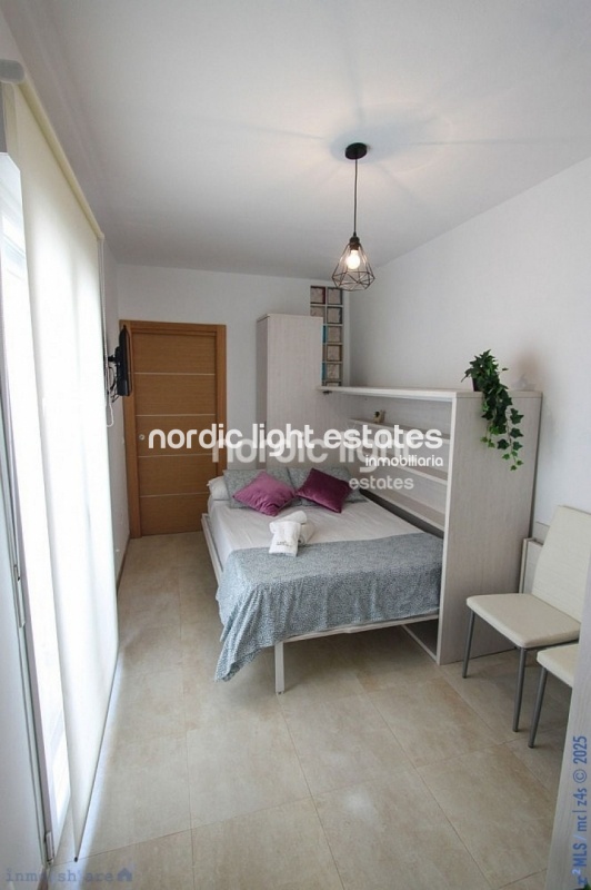 Casa adosada con 3 estudios reformados en Torrox