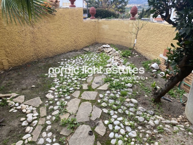 Bonita casa pareada con jardín y terrazas en Caleta de Vélez