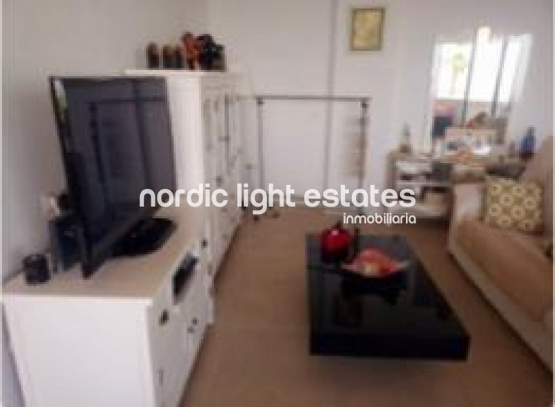 Apartment second line from the sea with parking space and storage room in Torrox Costa