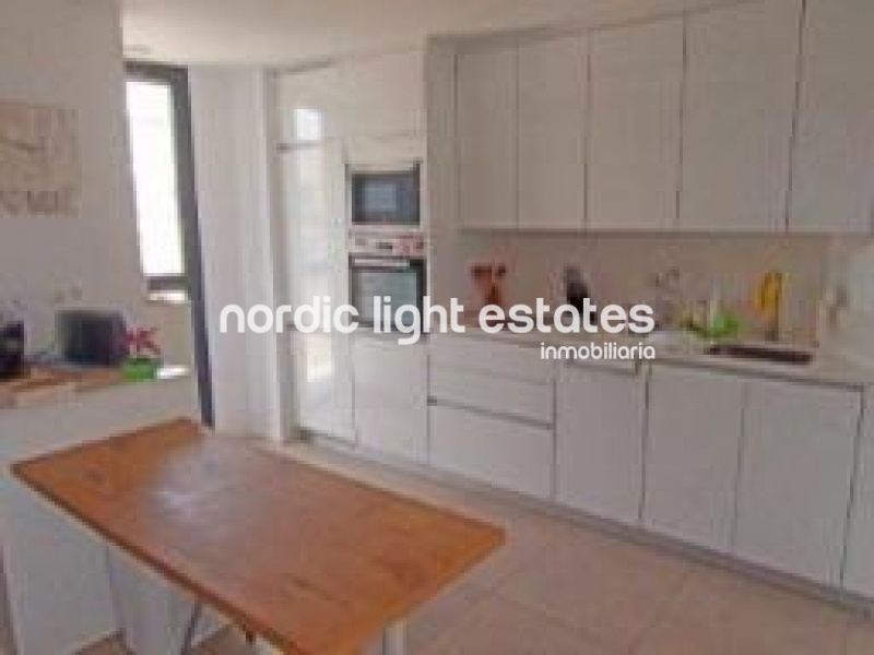 Apartment second line from the sea with parking space and storage room in Torrox Costa
