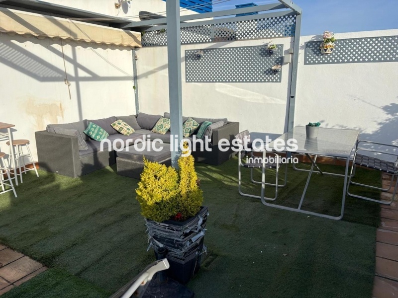 Beachfront living at its finest with this stunning penthouse duplex in Torrox Costa 