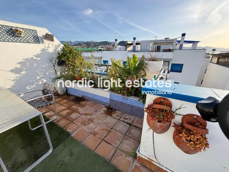 Beachfront living at its finest with this stunning penthouse duplex in Torrox Costa 