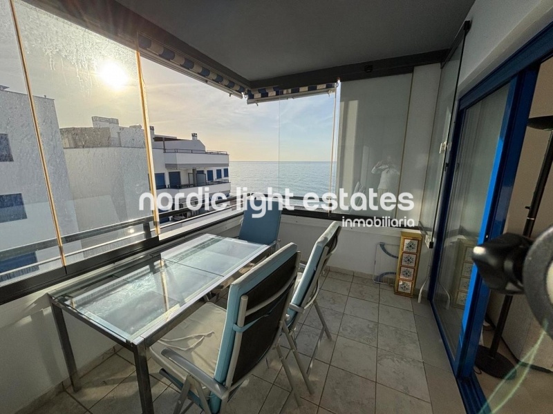 Beachfront living at its finest with this stunning penthouse duplex in Torrox Costa 