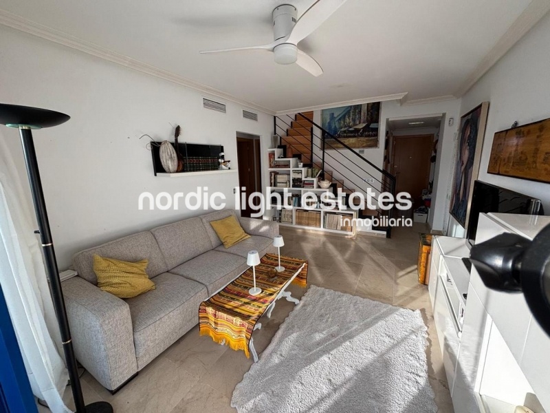 Beachfront living at its finest with this stunning penthouse duplex in Torrox Costa 