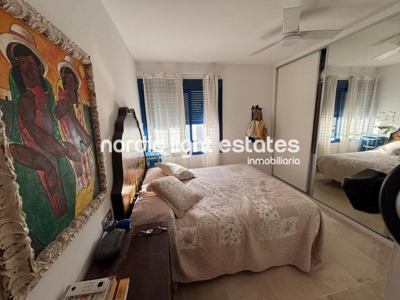Beachfront living at its finest with this stunning penthouse duplex in Torrox Costa 
