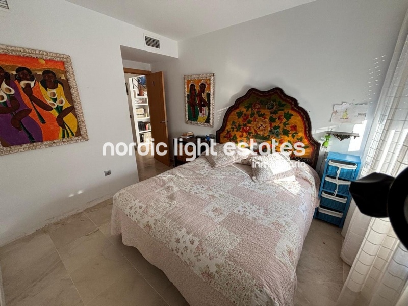 Beachfront living at its finest with this stunning penthouse duplex in Torrox Costa 