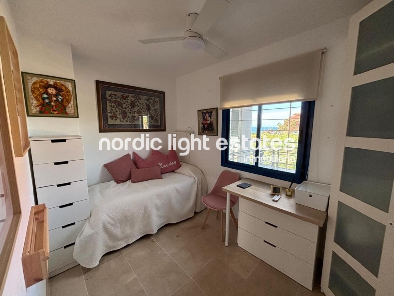 Beachfront living at its finest with this stunning penthouse duplex in Torrox Costa 
