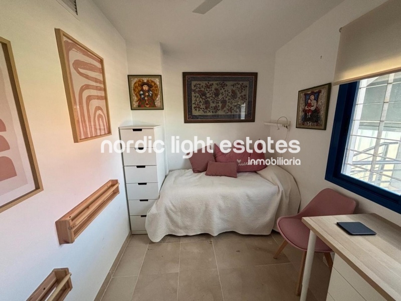 Beachfront living at its finest with this stunning penthouse duplex in Torrox Costa 