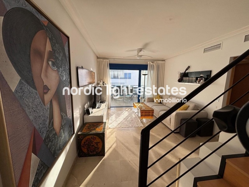 Beachfront living at its finest with this stunning penthouse duplex in Torrox Costa 