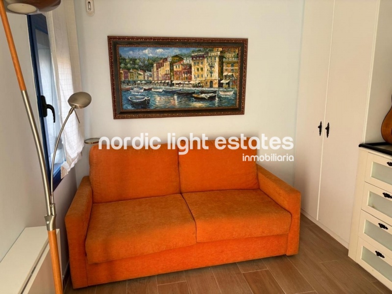 Beachfront living at its finest with this stunning penthouse duplex in Torrox Costa 