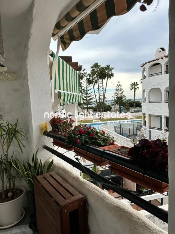 Excelente apartamento frente al mar con plaza de garaje y trastero en Benajarafe