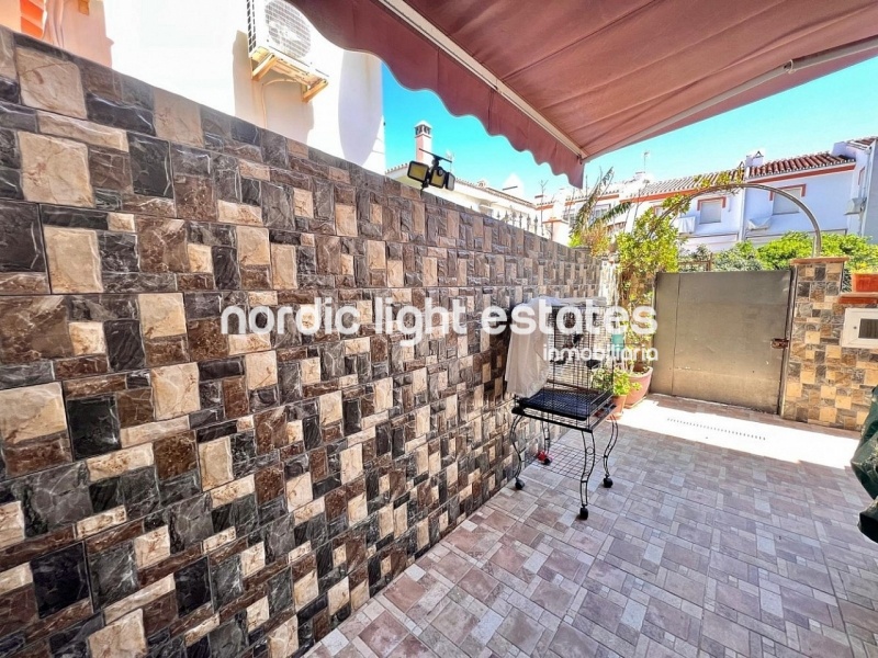 Lovely terraced house in prime location with 3 terraces in Torrox Costa