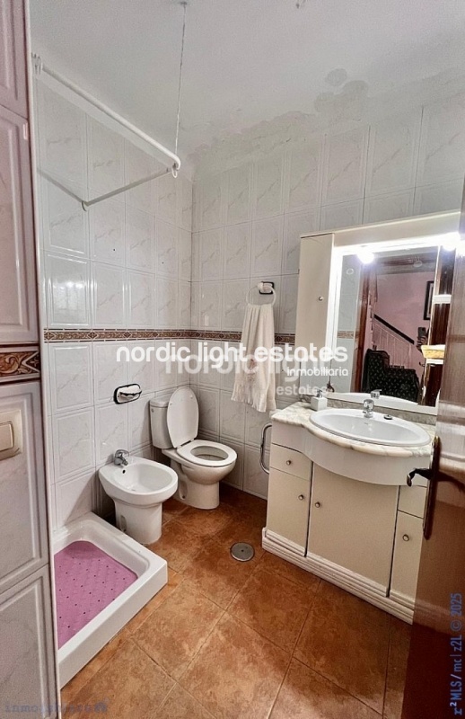 Spacious townhouse with an independent studio in Torrox Pueblo
