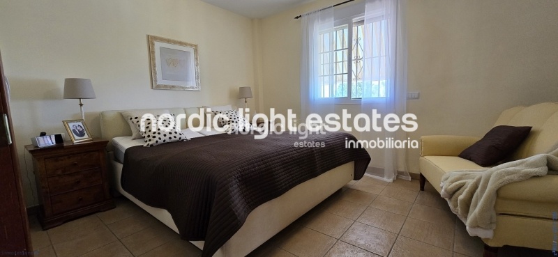 Exceptional villa with landscaped gardens, a pool, 2 enclosed garages, a sauna and much more